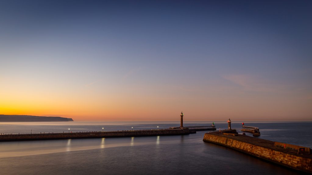 Dusk over Whitby Piers