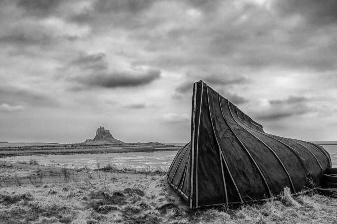 Lindisfarne Castle with traditional shed, made of upturned fishing boats
