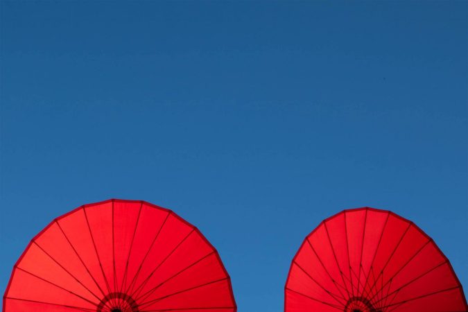 Two Red Parasols